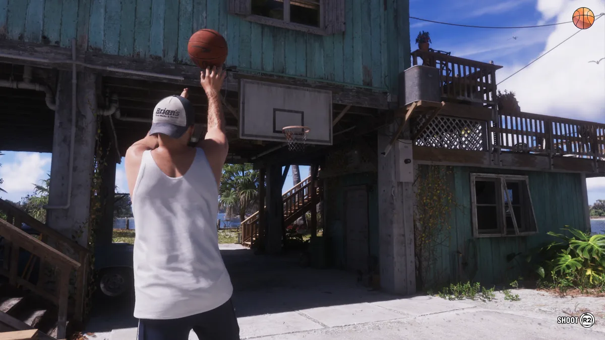 Jason shoots a basket in front of his safehouse in GTA 6, shot prompt displayed